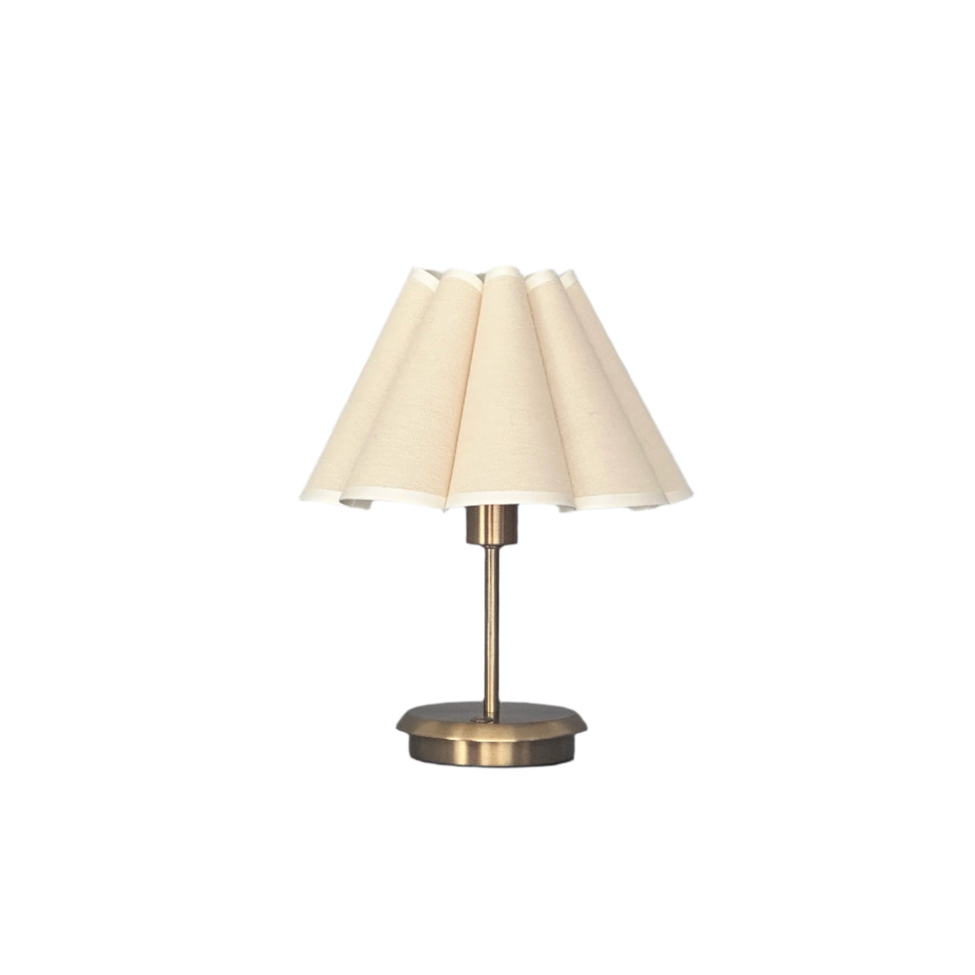 Dim room styled with brass lamp casting warm evening glow.