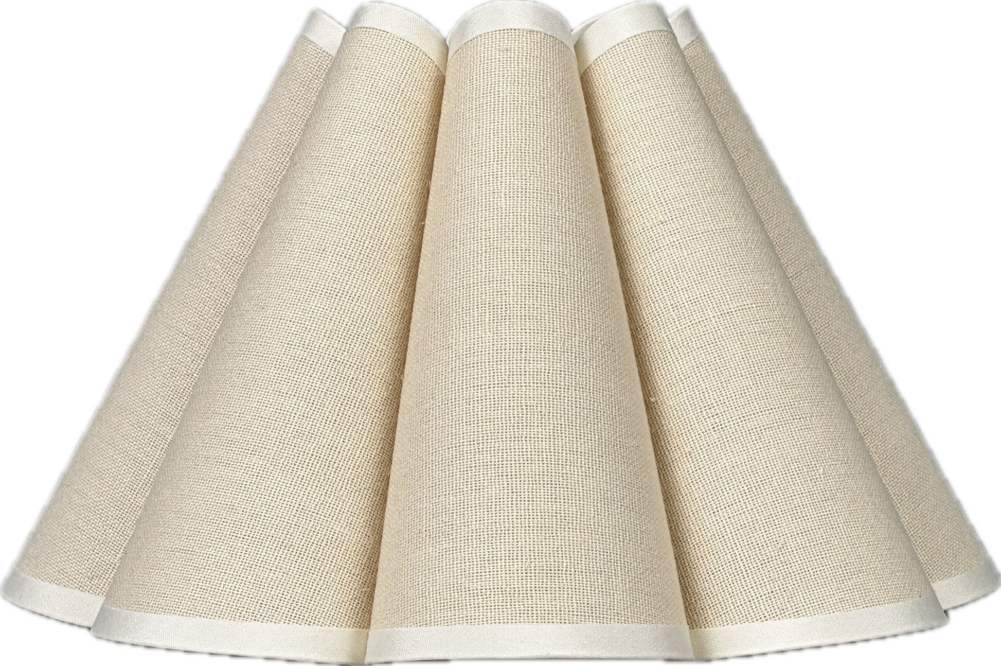 Kitchen corner with lamp, woven placemats, and ceramic plates.