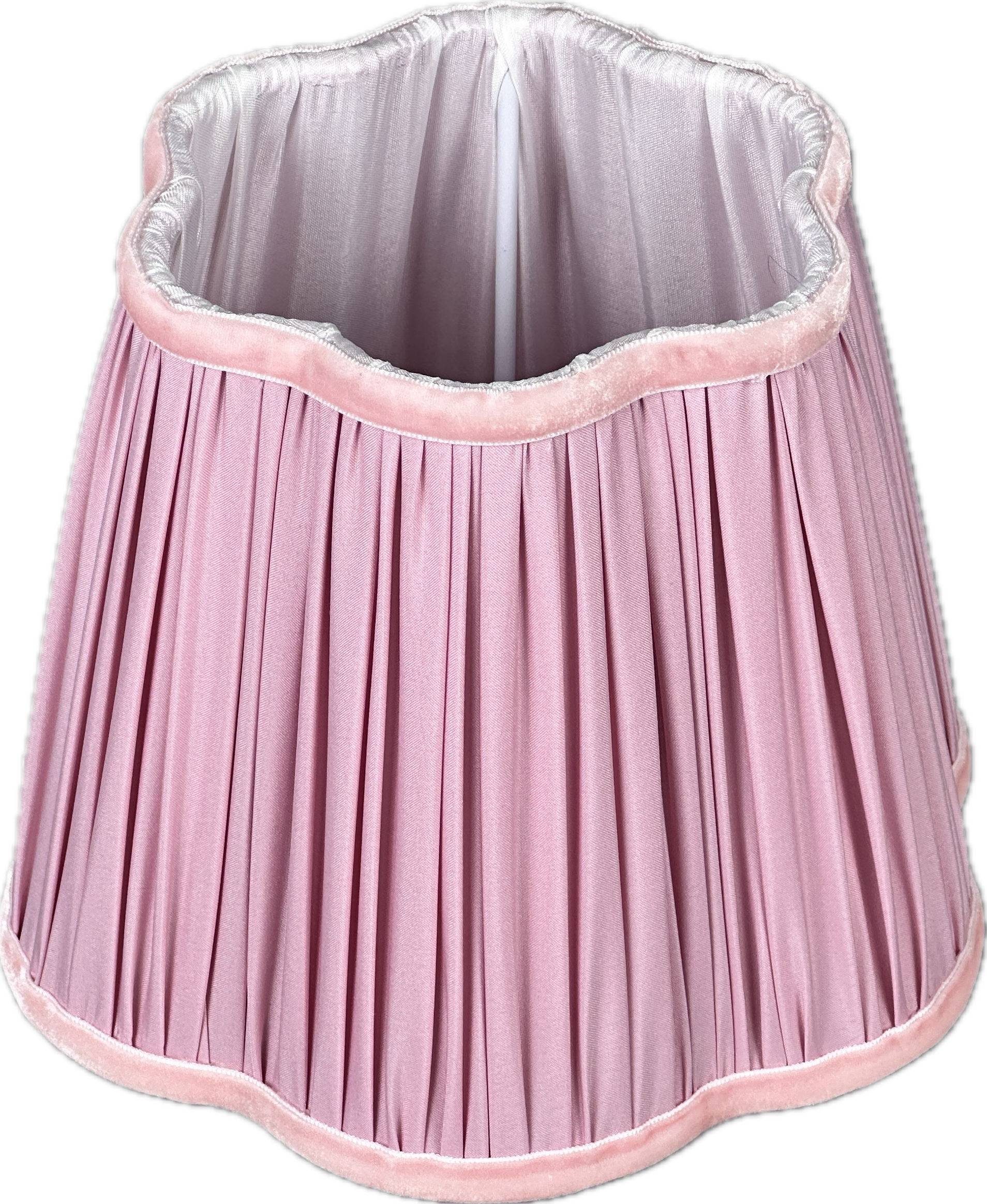 Styled table vignette with brass lamp, linens, and minimalist plates.