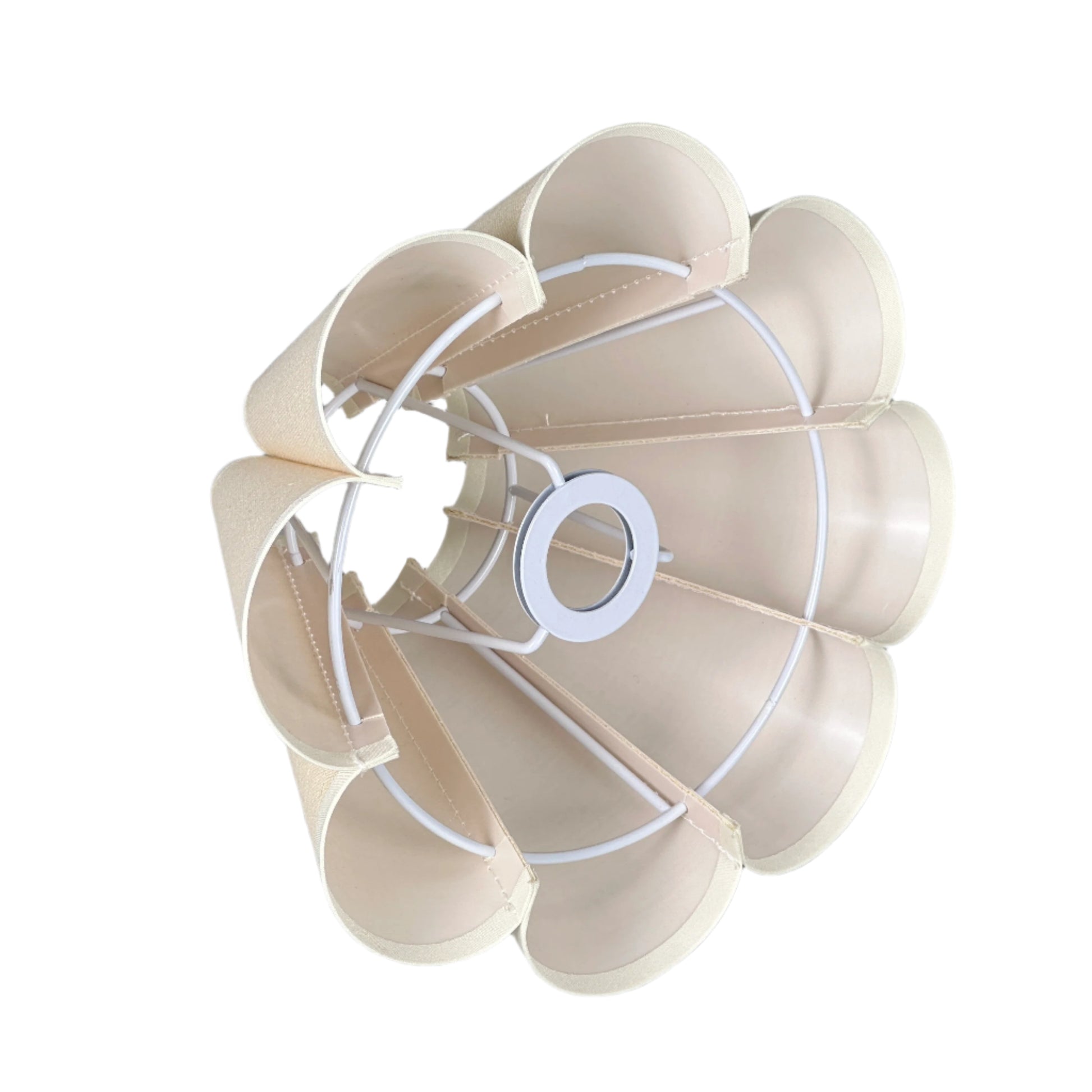 Daylight lounge nook with brass lamp on side table and woven rug.