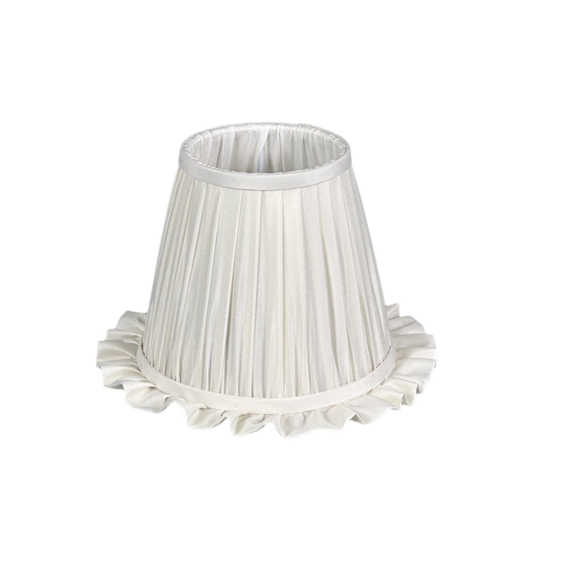 Minimalist sideboard with lamp, sculptural decor and neutral tones.