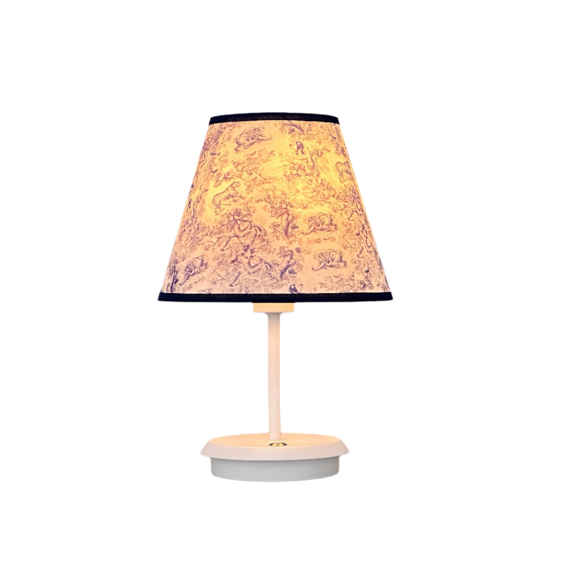 Neutral living space with brass lamp, vase, and soft furnishings.